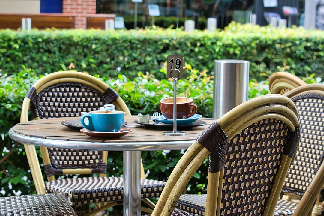 coffee cup on wooden table in cafe