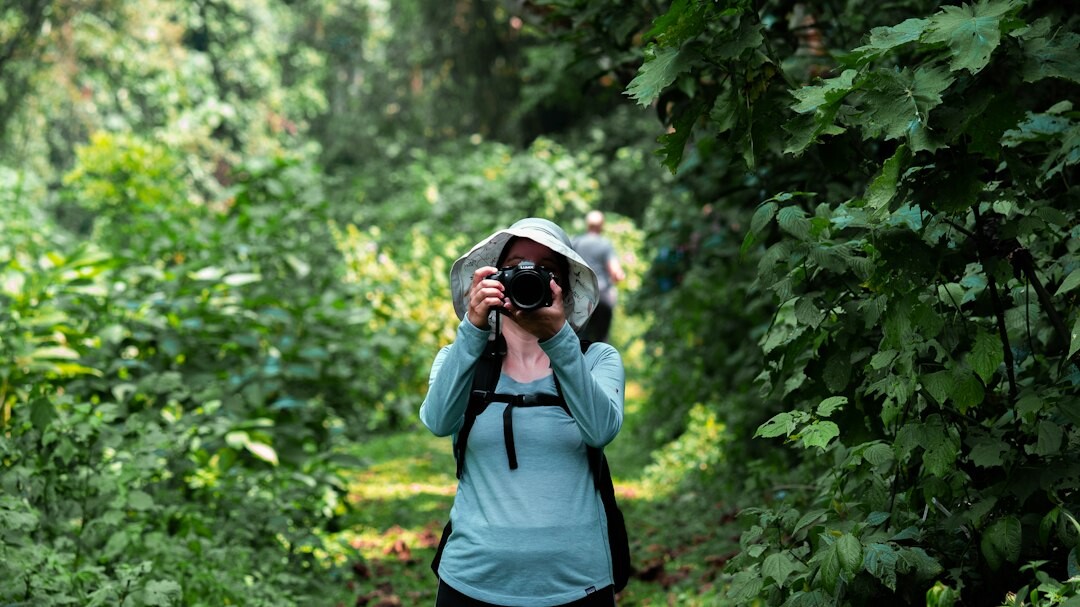 photographer with camera in nature